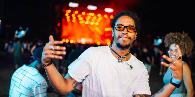 millennial man at a concert