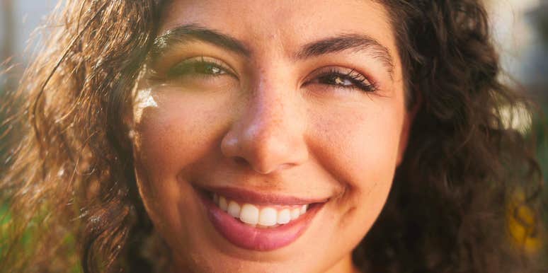 happy woman with tremendous inner strength smiling
