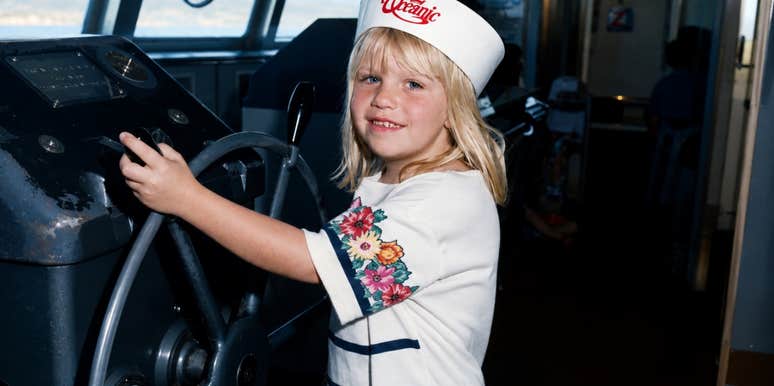 The author at age 7, captured in a moment of childhood joy; illustrating the young age at which the author experienced a life-threatening pharmaceutical reaction as discussed in the accompanying article.