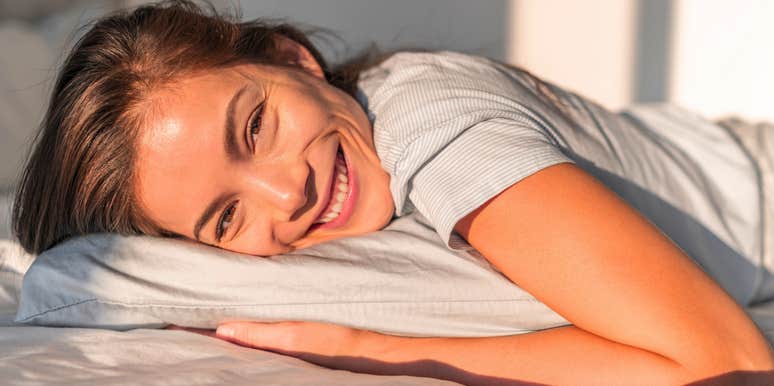 woman waking up happy ready to start the day with morning routine