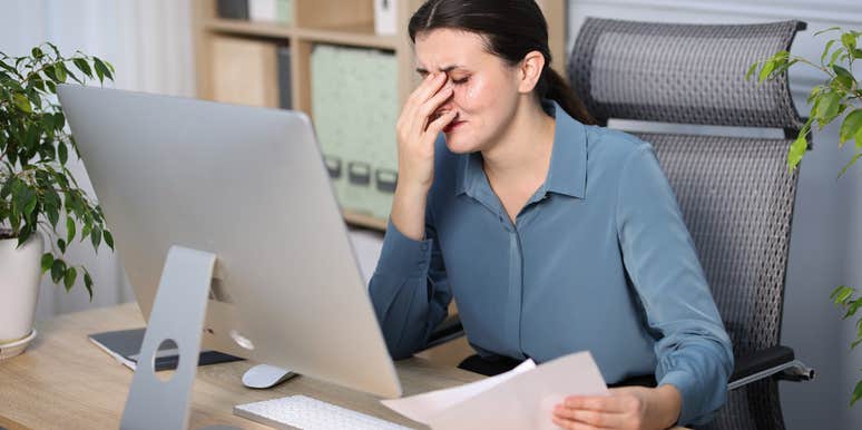 sad white-collar worker who is frustrated she can't advance in her career