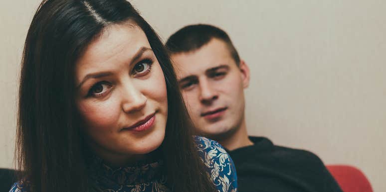 Man who expects woman to do ridiculous things looks at her like he's annoyed