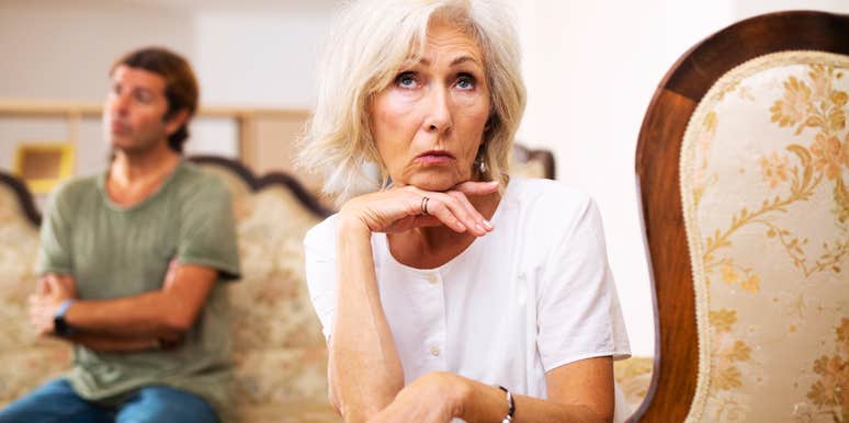 An elderly husband attempting to argue with his wife while she turns away and ignores him; illustrating 'strained communication' and the rigid, unhelpful conflict dynamics common in traditional mid-century partnerships.