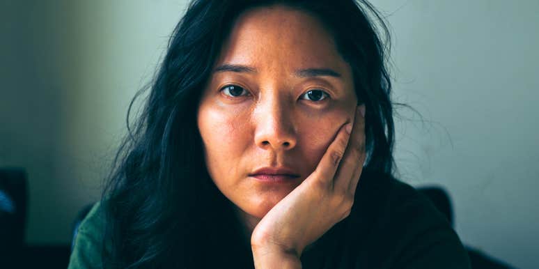 stressed out woman feeling emotionally numb