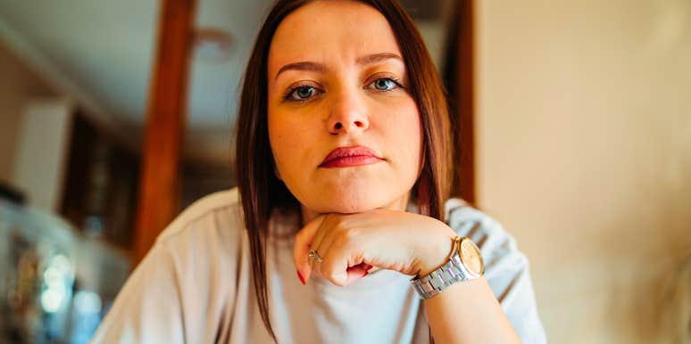 highly aware woman looking ahead thoughtfully