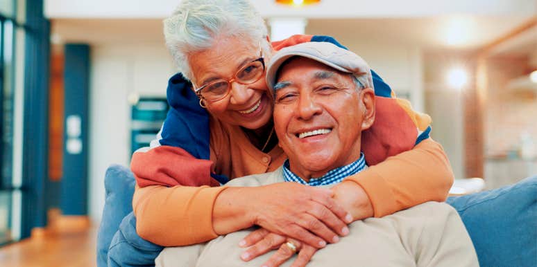 older couple deeply in love smiling together