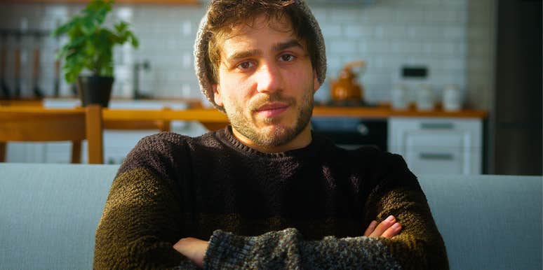 unemployed lazy man sitting at home bored