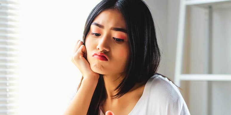 Woman who didn't get the love she needed looks sad 