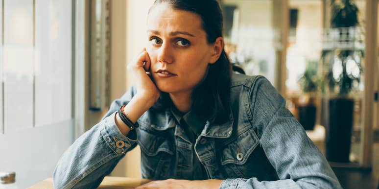 highly sensitive woman thinking deeply feeling uncomfortable