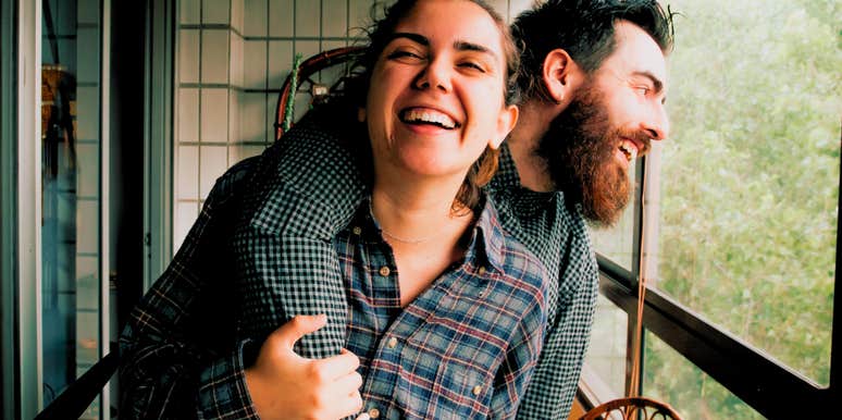 happy couple with woman feeling secure with her husband