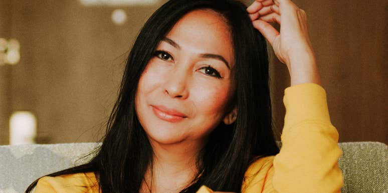 A woman with a steady, resilient gaze looking forward, representing an 'internal locus of control' and rare character traits.