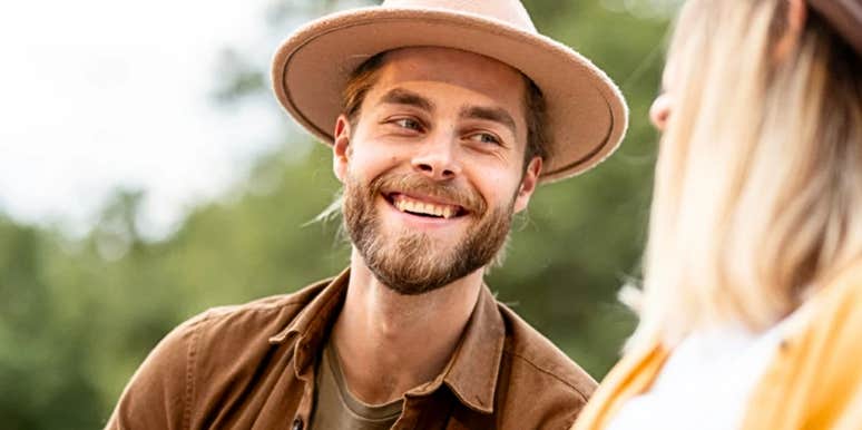 man with a strong relationship IQ smiles warmly at a woman