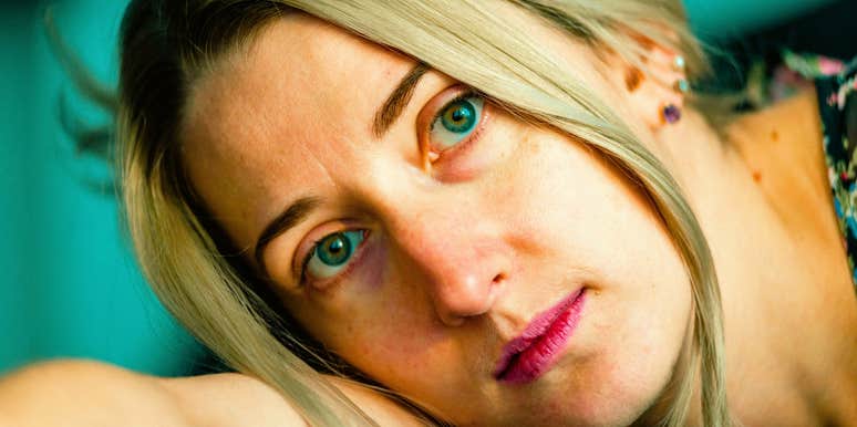 woman with a big heart who lacks common sense staring