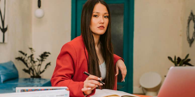gen z professional woman looking serious in the office