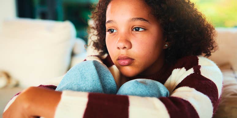sad young girl growing up with avoidant parents