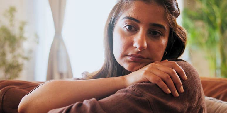 adult woman who grew up with parents who gave her trauma