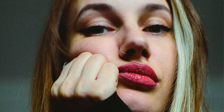 intelligent woman worrying and pouting