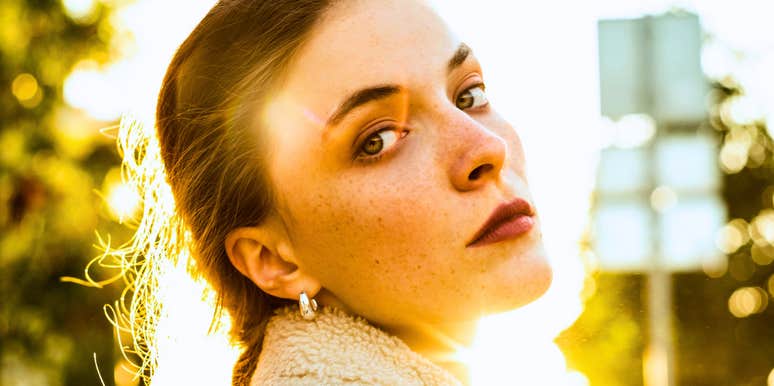 woman with emotional courage turning back
