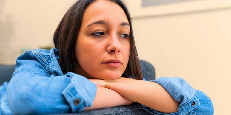 exhausted tired despondent woman zoning out