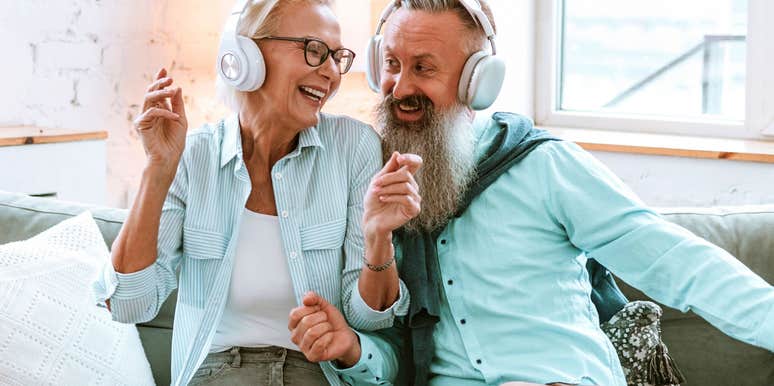 boomer couple listening to love songs from the 1980s