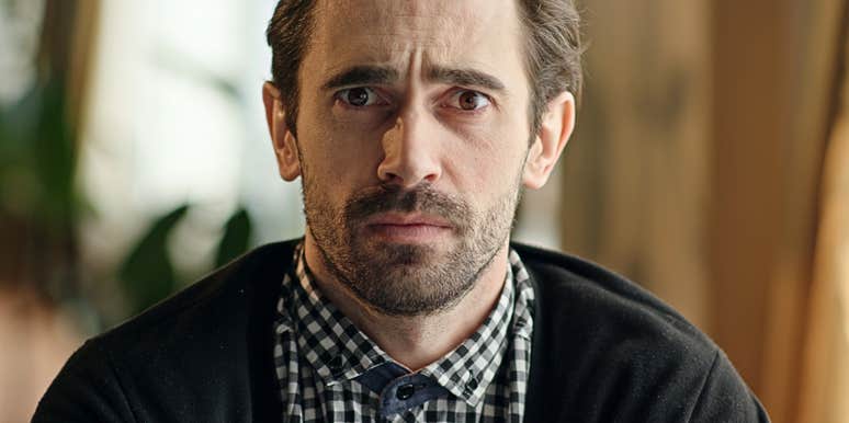 man looking stressed about financial instability 