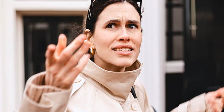 woman with a low quality vibe shrug rudely 