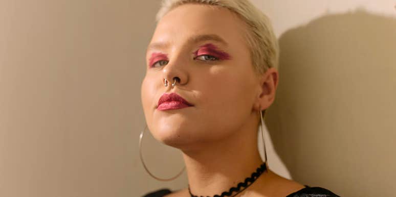 woman with no emotional consistency staring serious