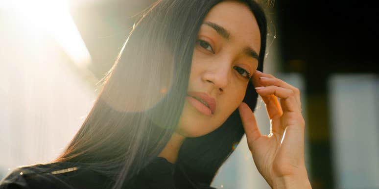 serious unhappy woman deep in thought