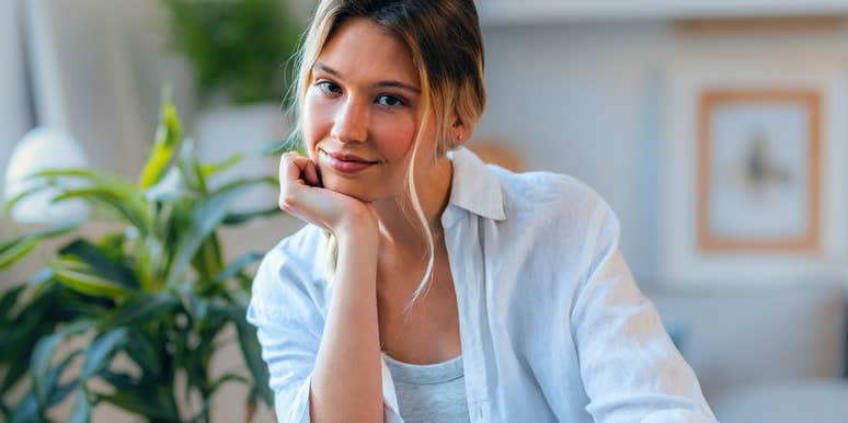 quick-thinking woman with a fast brain deep in thought smiling
