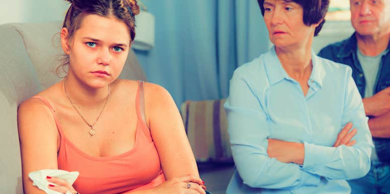 young woman annoyed her parents aren't listening