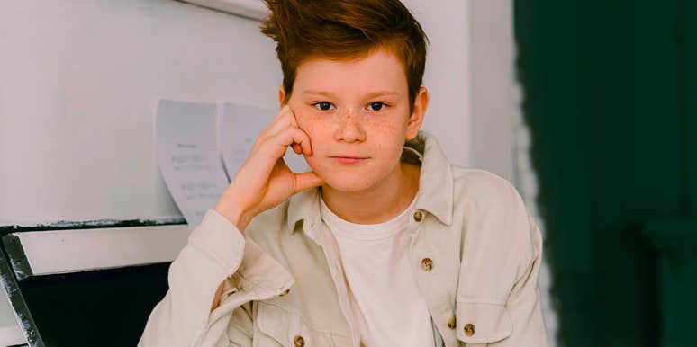 spoiled entitled kid sitting at home 