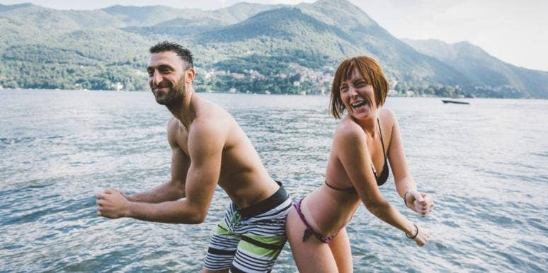 The Weird Way Farting Is Good For Your Relationship, Says Study couple touching butts together