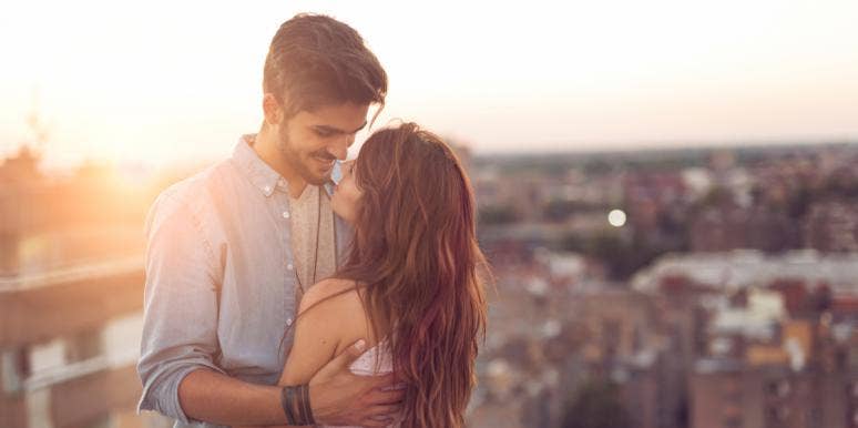3 Signs You're Dangerously Obsessed With Your New Relationship woman and man hugging