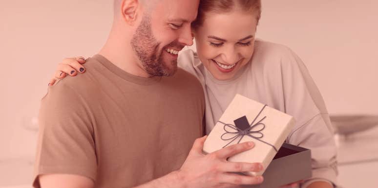 couple opening a gift