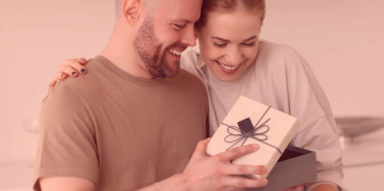 4 Christmas Gift Ideas That Could Actually Save Someone’s Life couple opening a gift