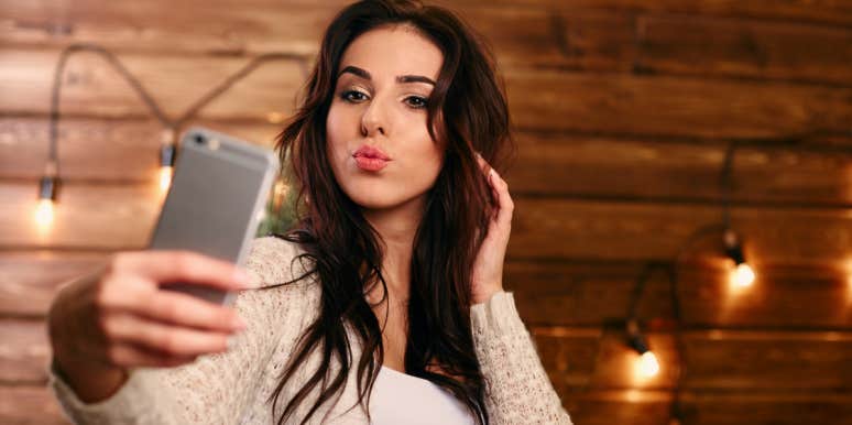 5 Snap Judgements People Make, Based Solely On Your Profile Pic woman taking selfie
