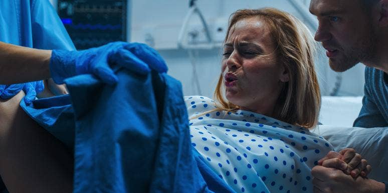 5 Things You Shouldn't Do In Labor, According To A Delivery Nurse woman giving birth