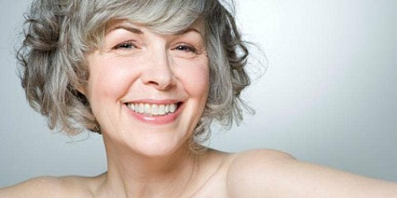grey haired woman smiling