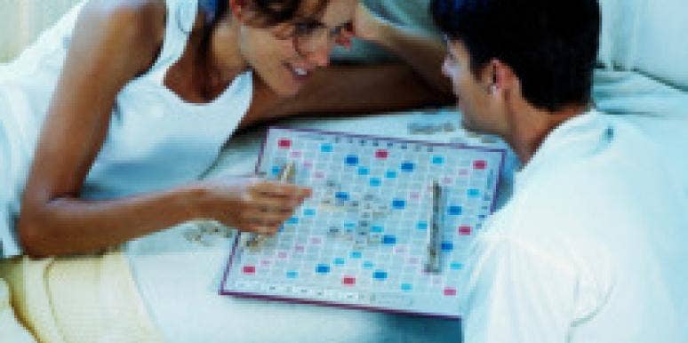 Can A Relationship Get Cozy Too Quickly? man woman scrabble
