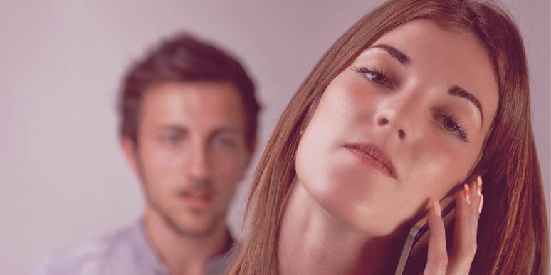 Want Men To Ask You Out? Stop Making These 6 Mistakes woman on her phhone