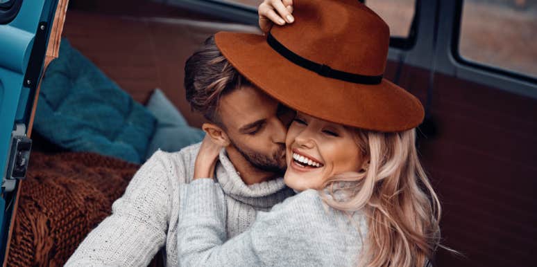 6 Ways Happy Couples Show How Much They 'CHERISH' Each Other man kissing woman