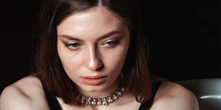 7 Hidden Signs Someone Is Insecure (And How To Get Over It) insecure woman