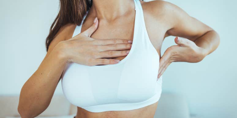 If You Spot Any Of These 7 Things On Your Breasts, See A Doctor ASAP woman doing breast exam in mirror