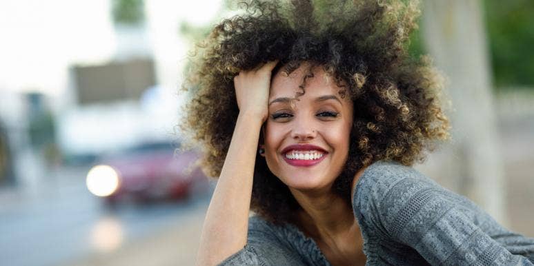 7 Vital Habits Of Optimistic People That Tend To Be The Happiest smiling woman