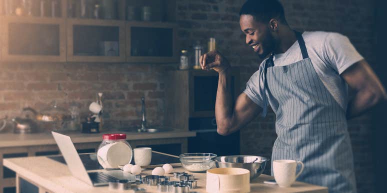 7 Easy Ways To Catch A Woman's Attention — And Keep It man cooking