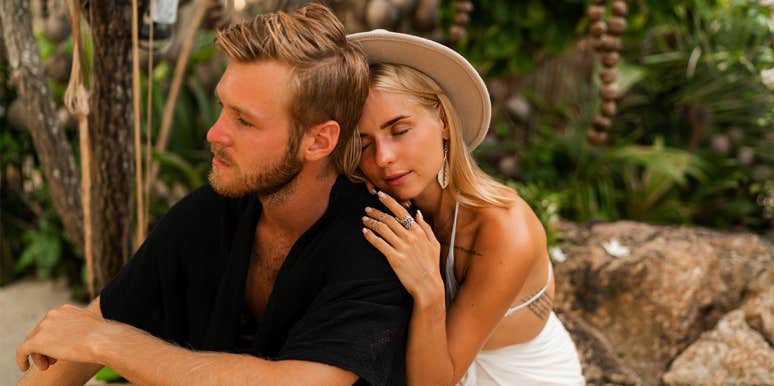 8 Secrets To Take Your Marriage From "Meh" To Magical woman hugging man