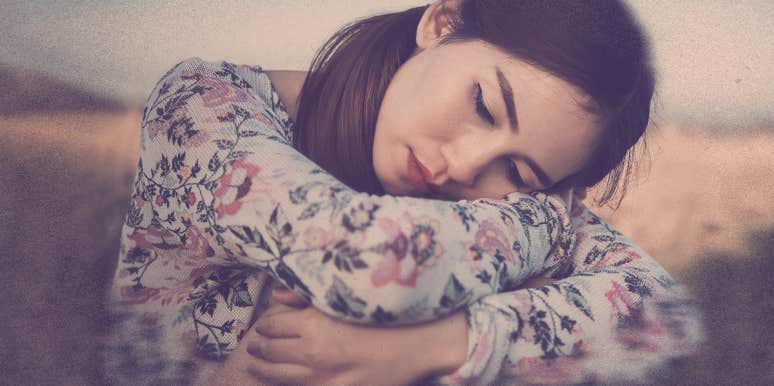 9 Signs You Have An Anxious Attachment Style woman sitting on floor, look sad
