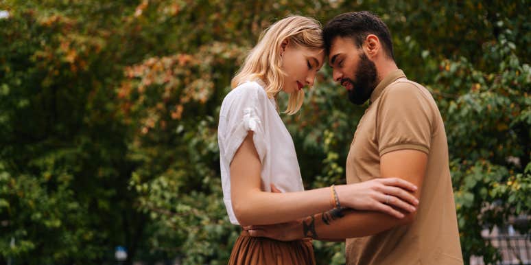 Signs You’re In Love With A Man, Not A Boy couple embracing