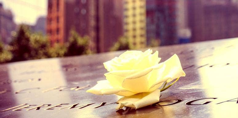 9/11 Stories: I Was Blamed For The September 11 Terrorist Attacks white rose placed on name in black granite at NYC's 9/11 memorial