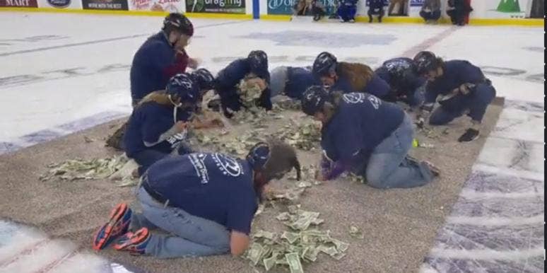 Viral Video Shows South Dakota Teachers Scrambling To Grab Cash In 'Dystopian' Game South Dakota teachers scramble for one dollar bills